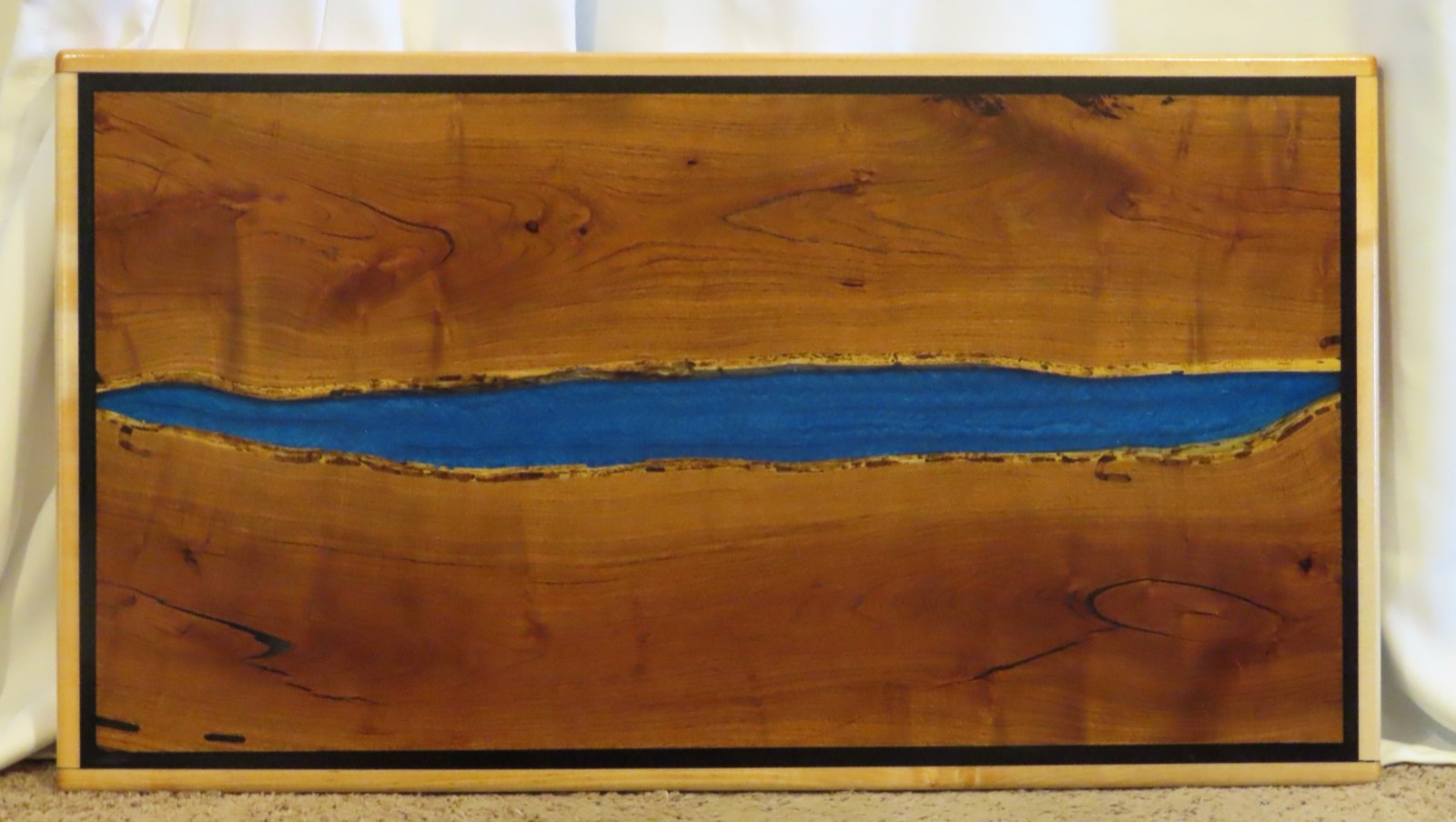 Mesquite Coffee Table. 42 x 23 Blue River, Maple Wood and Black Border, Signature Finish